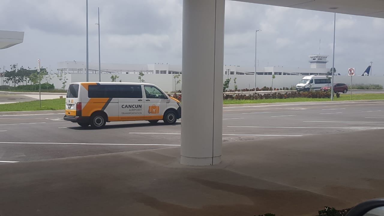 Van for Private Transfer outside of airport terminal