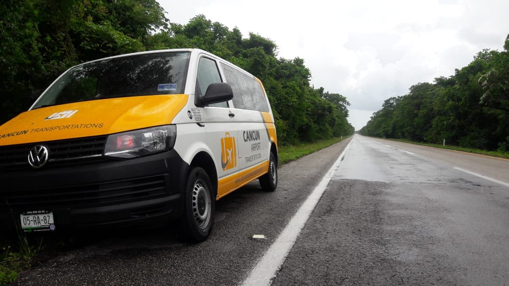 Private Transfer van parked aside of empty road