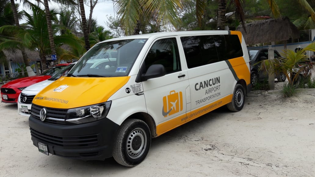 Van used for Private Transfers at a beach parking lot